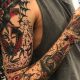 Top Tattoo Sleeve Filler Ideas & Designs | Meaningful Tattoos: Symbols with Deep Personal Significance