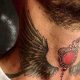 Top 5 Neck Tattoo Ideas For Men: A Guide | Meaningful Tattoos: Symbols with Deep Personal Significance