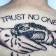 Best Trust No One Tattoo Ideas & Designs | Meaningful Tattoos: Symbols with Deep Personal Significance